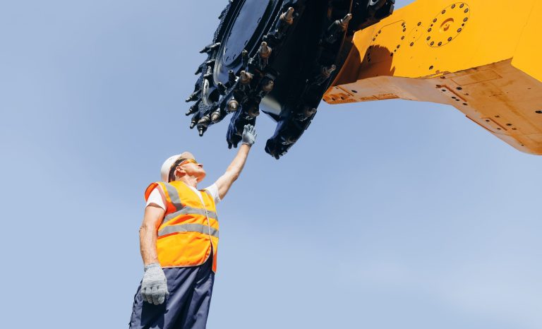 Mining,Operator,Working,With,Industry,Harvester,Shearer,Drill,Head.,Miner