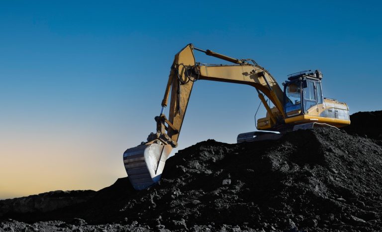 Coal,Mining,In,An,Open,Pit.,Mining,Excavator,Loads,Coal