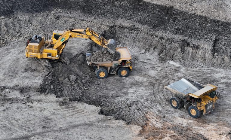 Work,Of,Trucks,And,The,Excavator,In,An,Open,Pit