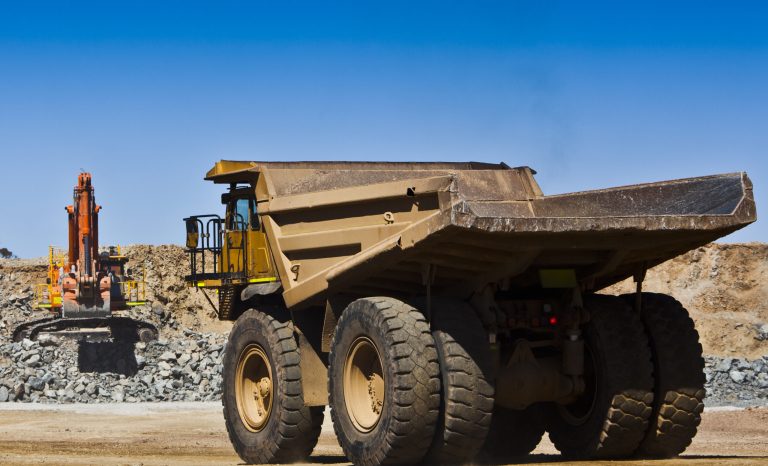 Mining,Scene.,Large,Truck,Drives,Towards,Digger,To,Fill,With