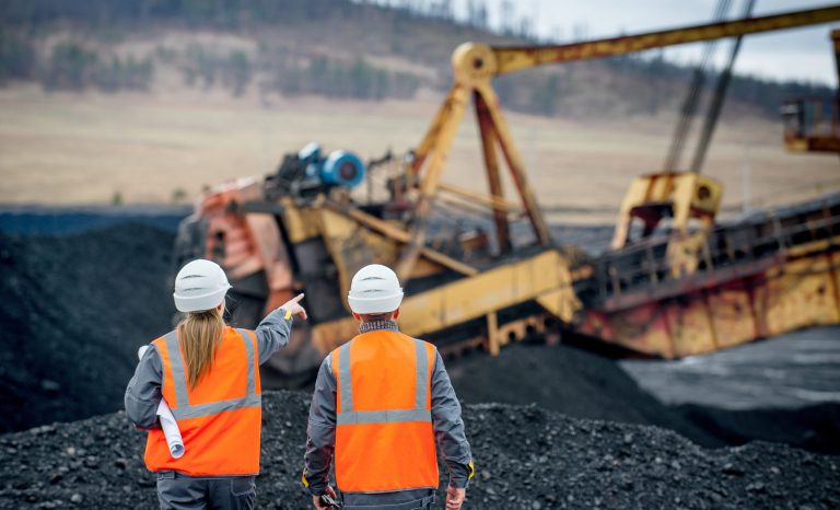 Coal,Mine,Workers,In,An,Open,Pit